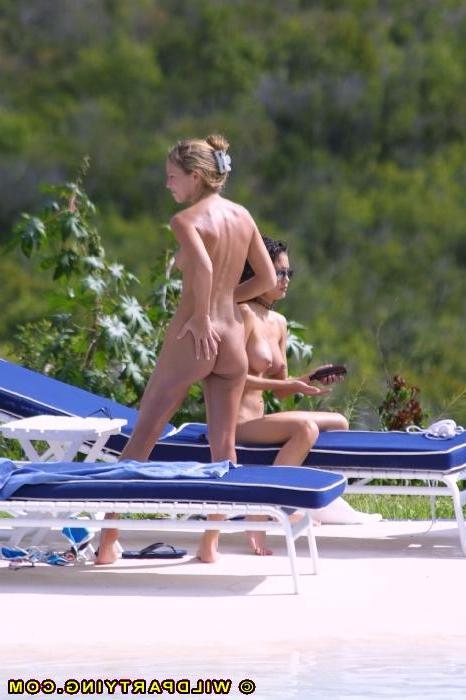 18P A few naked beach babes go tanning