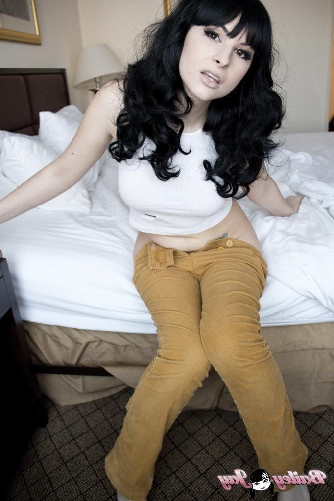 12P Busty Bailey Jay stripping on the bed