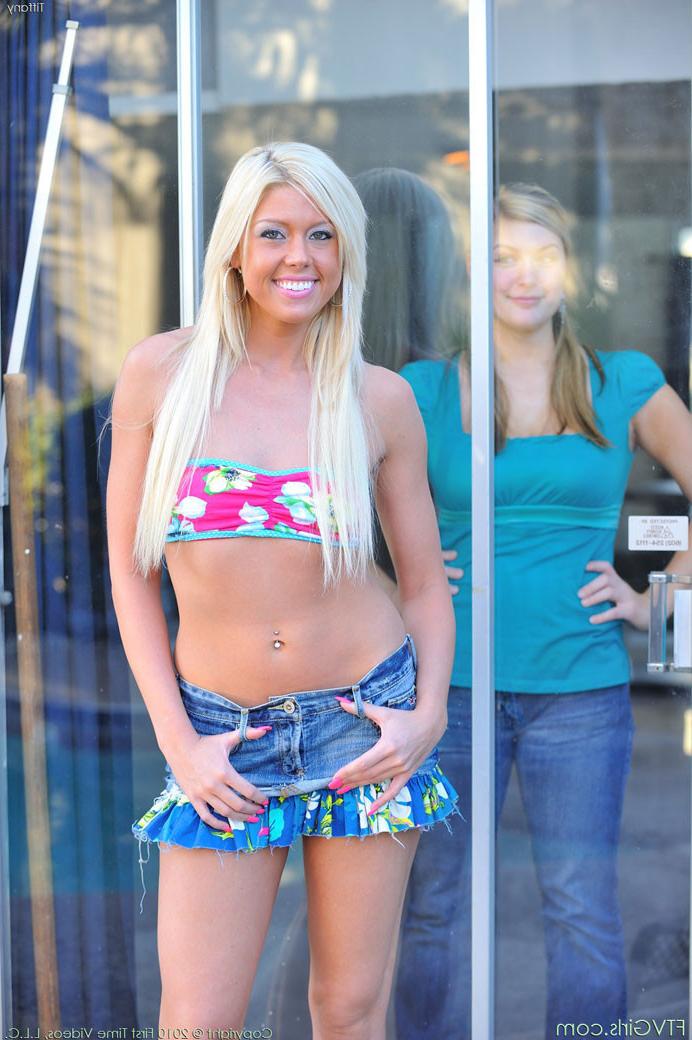 14P Sexy American blonde babe toys her pussy in public