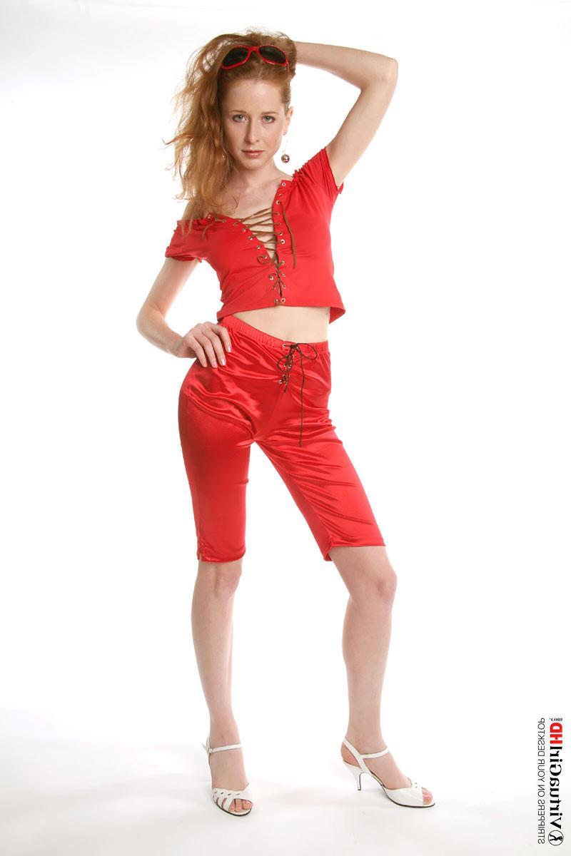 16P Skinny redhead girl Lucie T teasing and stripping