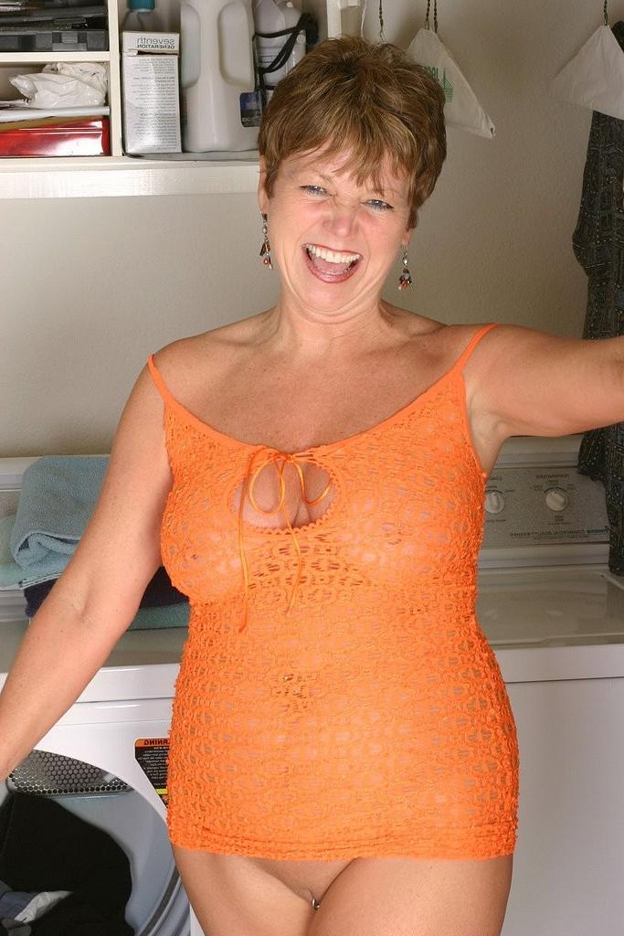 16P Busty grandma Mitzi plays with her pierced clit