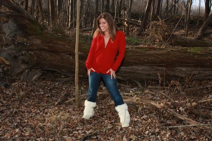 15P Young babe stripping in the woods