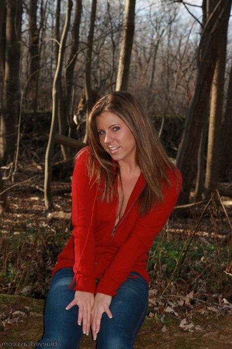 15P Young babe stripping in the woods