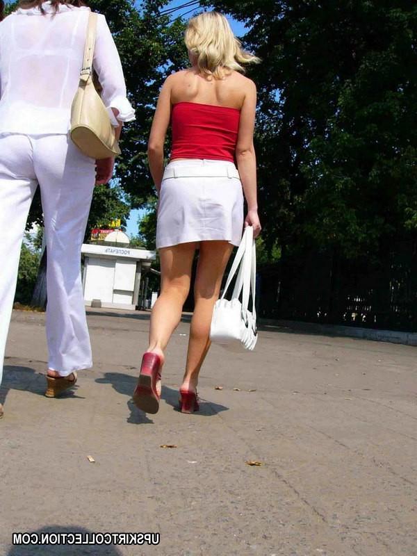 15P Slim lady going upstairs and getting followed by camera guy