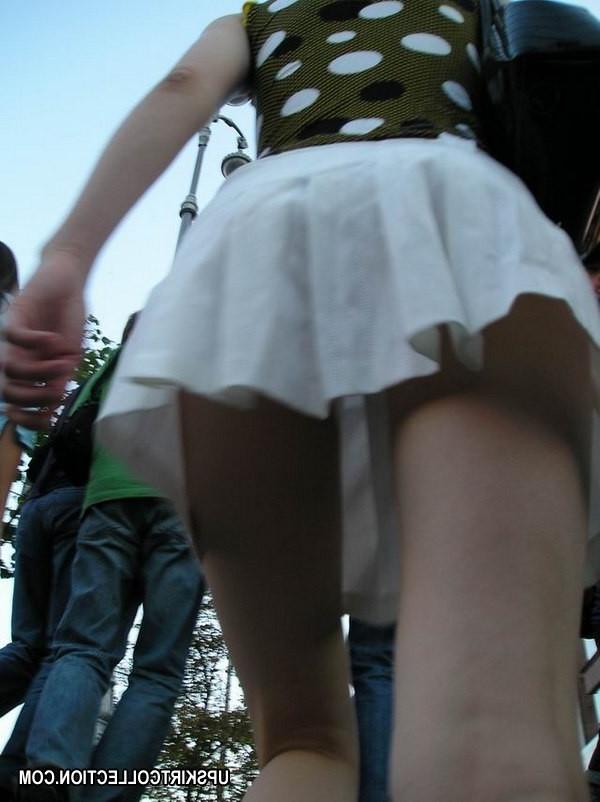 15P Slim lady going upstairs and getting followed by camera guy