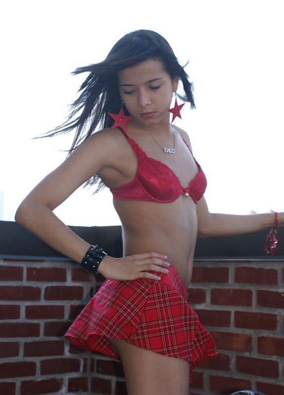 20P Skinny shemale shows ass on balcony