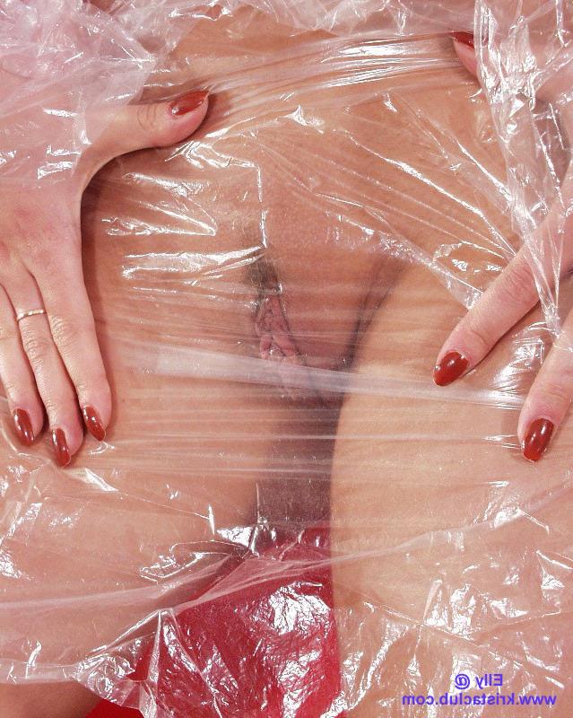 20P Hot blond girl in rainwear and rubber boots