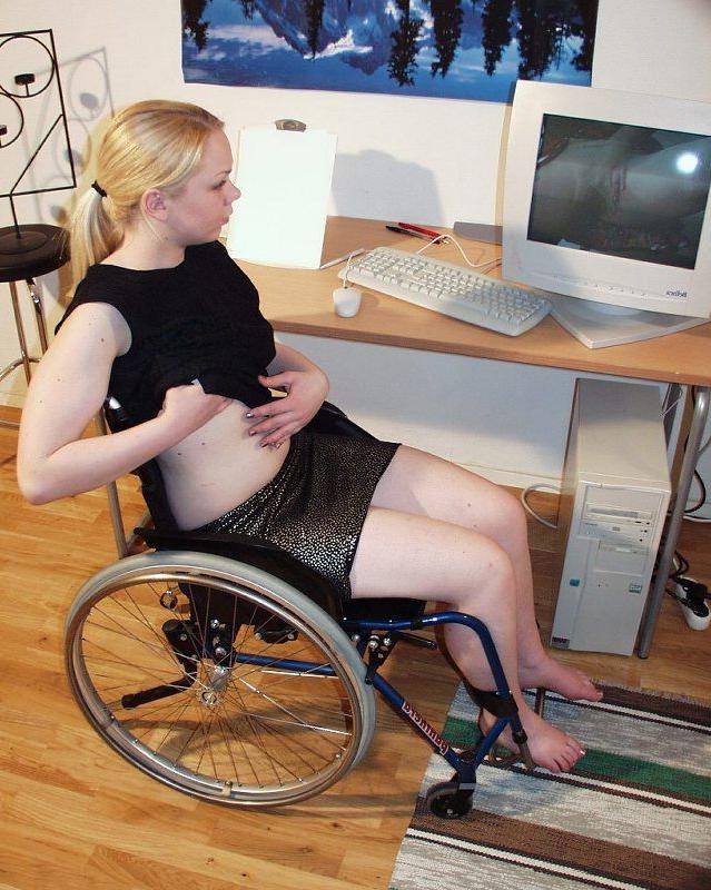 15P Sexy girl masturbating in her wheelchair