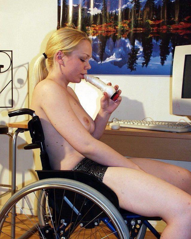 15P Sexy girl masturbating in her wheelchair