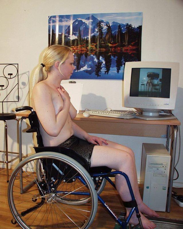 15P Sexy girl masturbating in her wheelchair