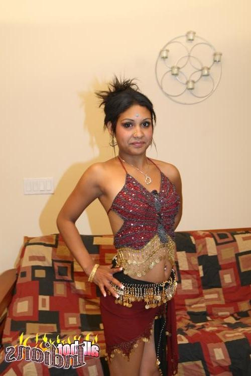 15P Ponytailed Indian wench strips and shows her round boobies
