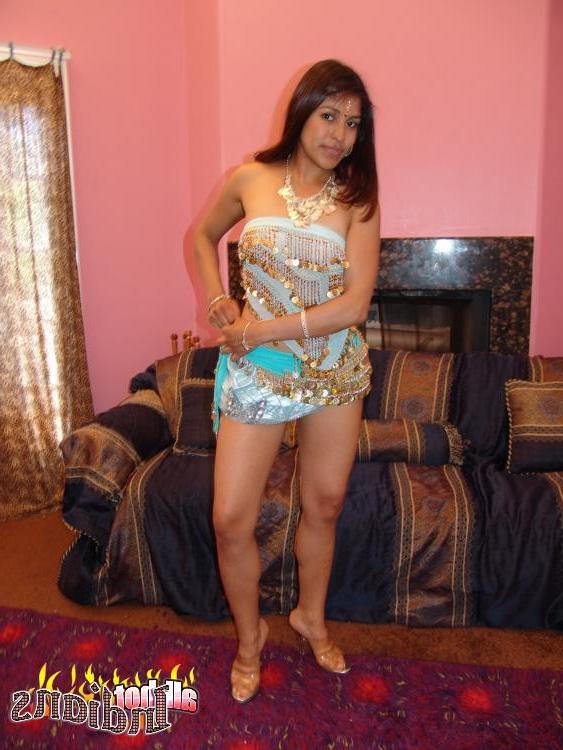 15P Insidious Indian babe teasing us with her sexy black thongs
