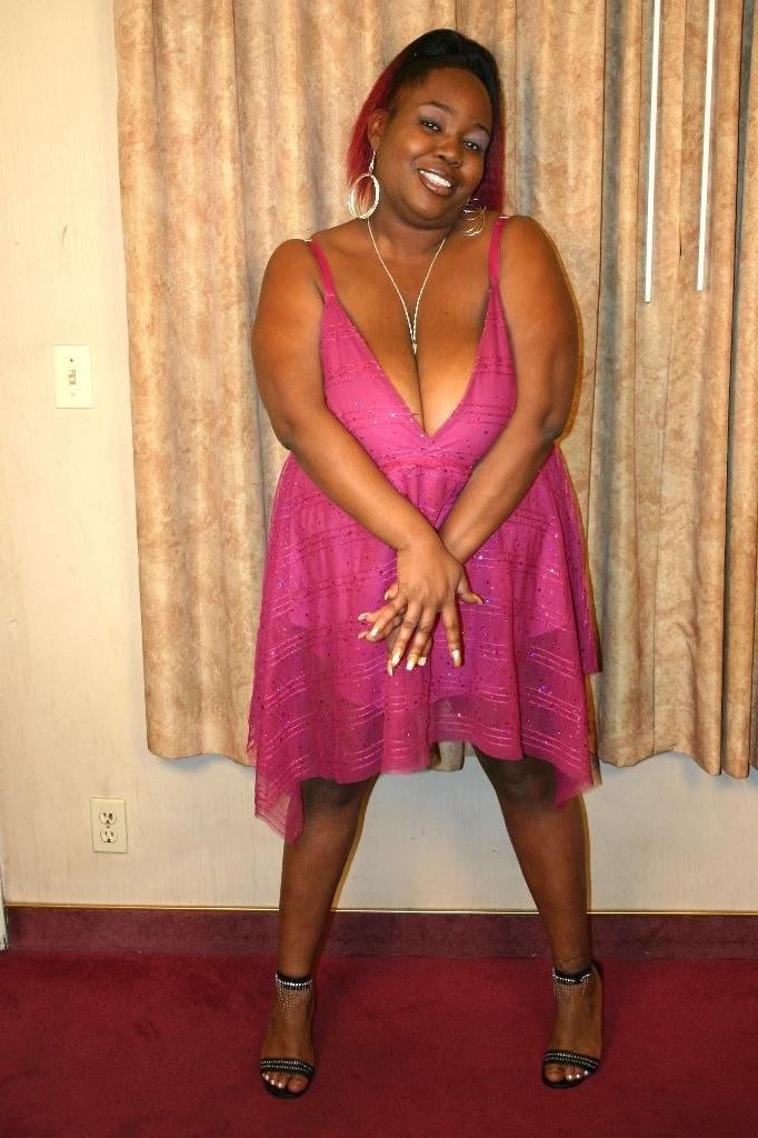 16P Big black and busty ebony Black Cherry playing with her bra busting hooters whil