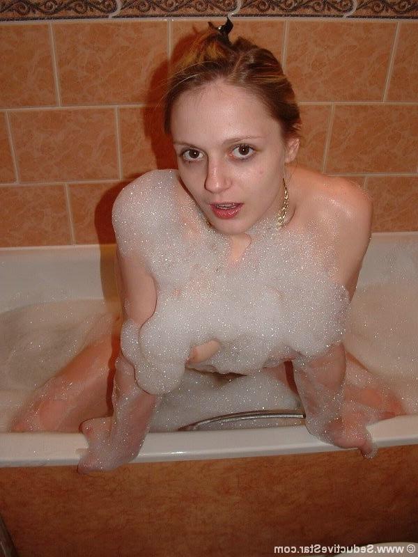 20P Very sexy blonde shows her tight pink pussy