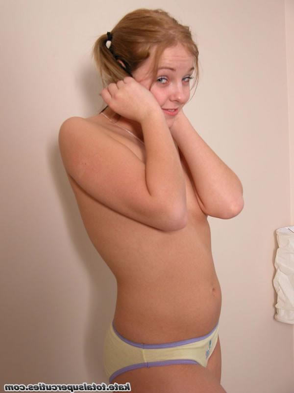 16P Pigtail teen lifts her skirt and shows you her world