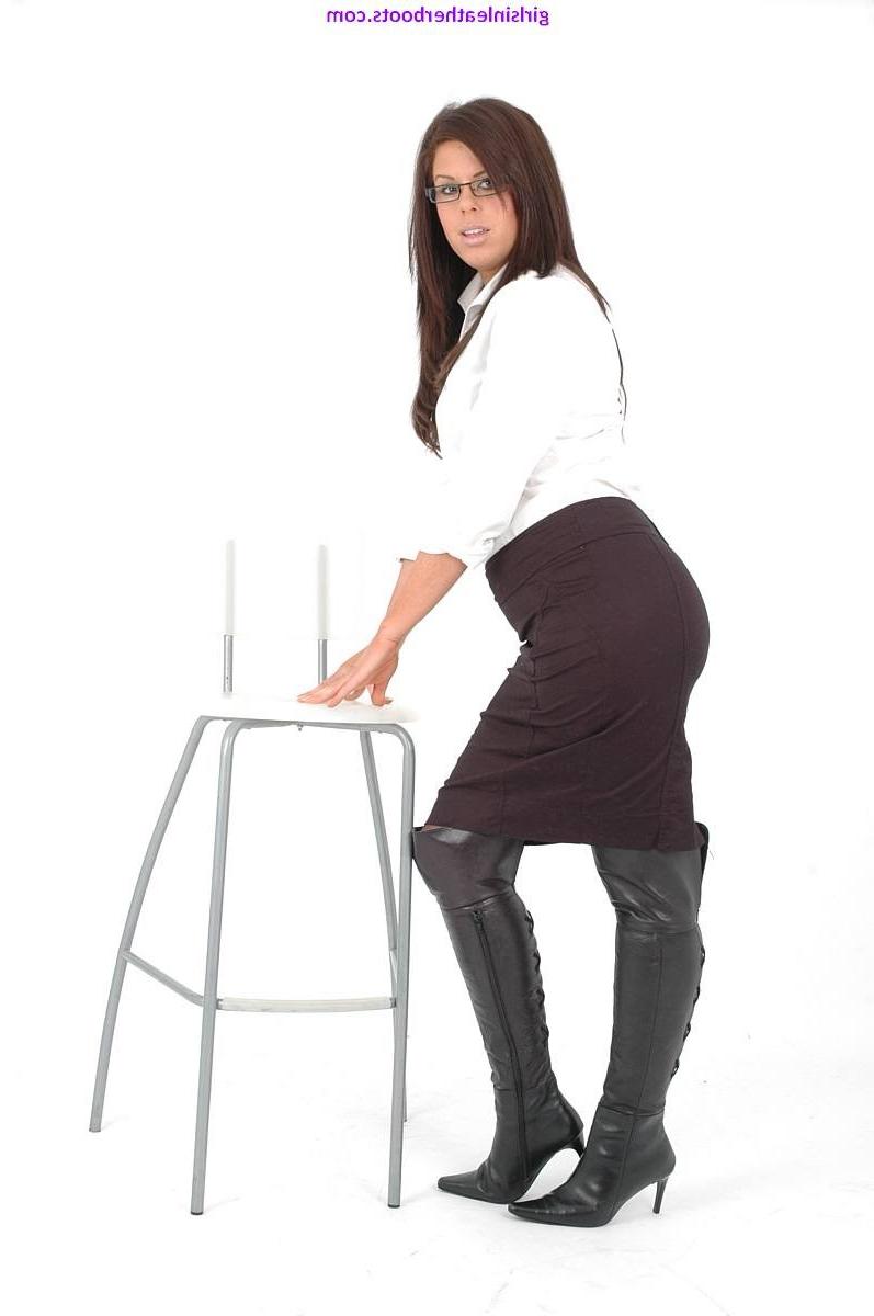 14P Busty secretary babe gives you an eyeful of her big tits under her hot black lin