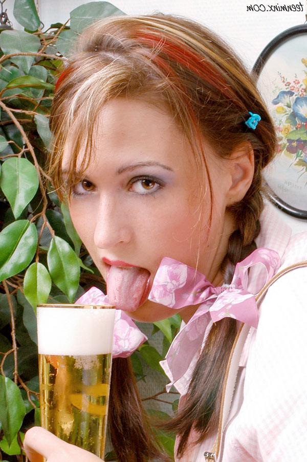18P Pigtailed german beer girl with humongus natural hooters strips