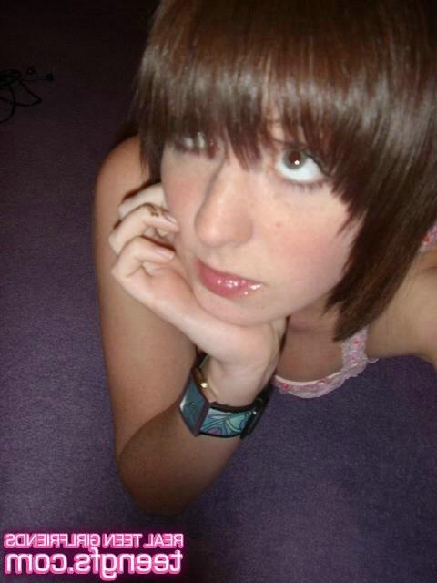 16P a charming teen babe showing her pink pussy