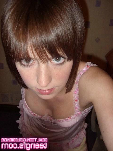 16P a charming teen babe showing her pink pussy