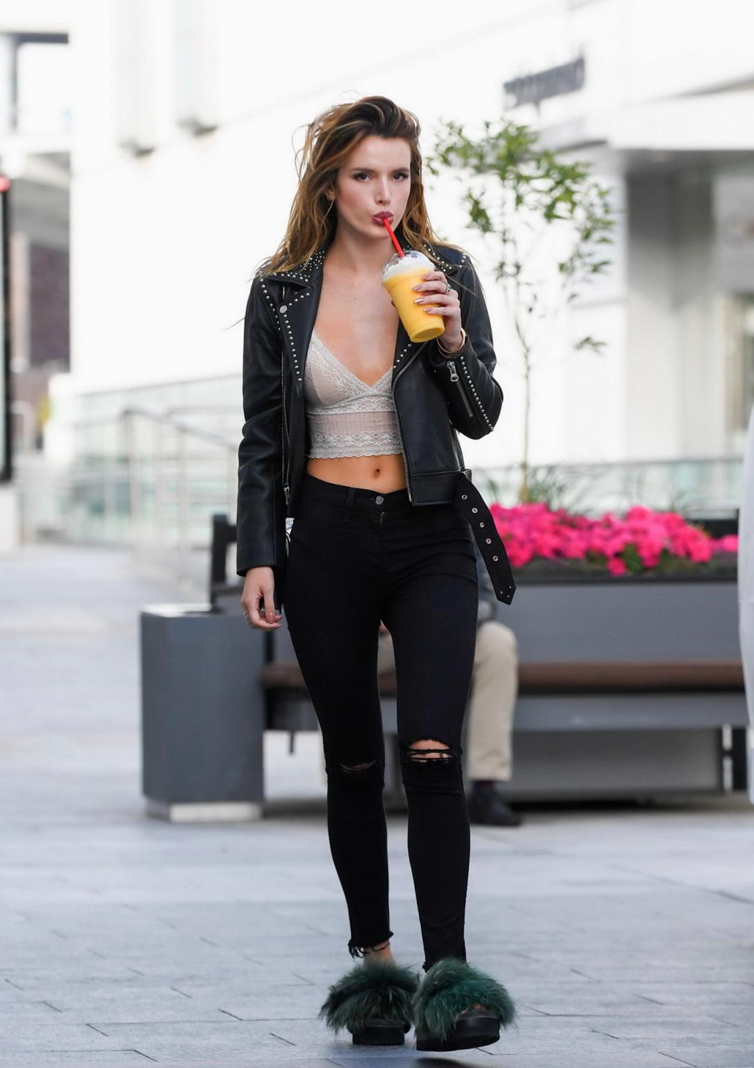 16P Bella Thorne busty in lace crop top and ripped jeans