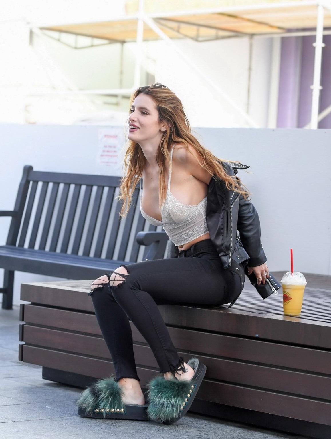 16P Bella Thorne busty in lace crop top and ripped jeans