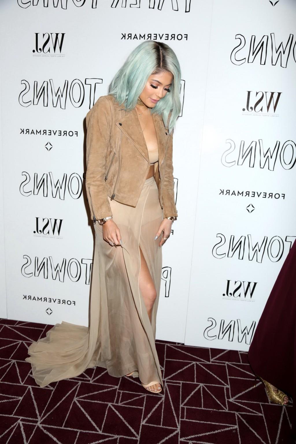16P Kylie Jenner busty wearing crop top  see through skirt at Paper 