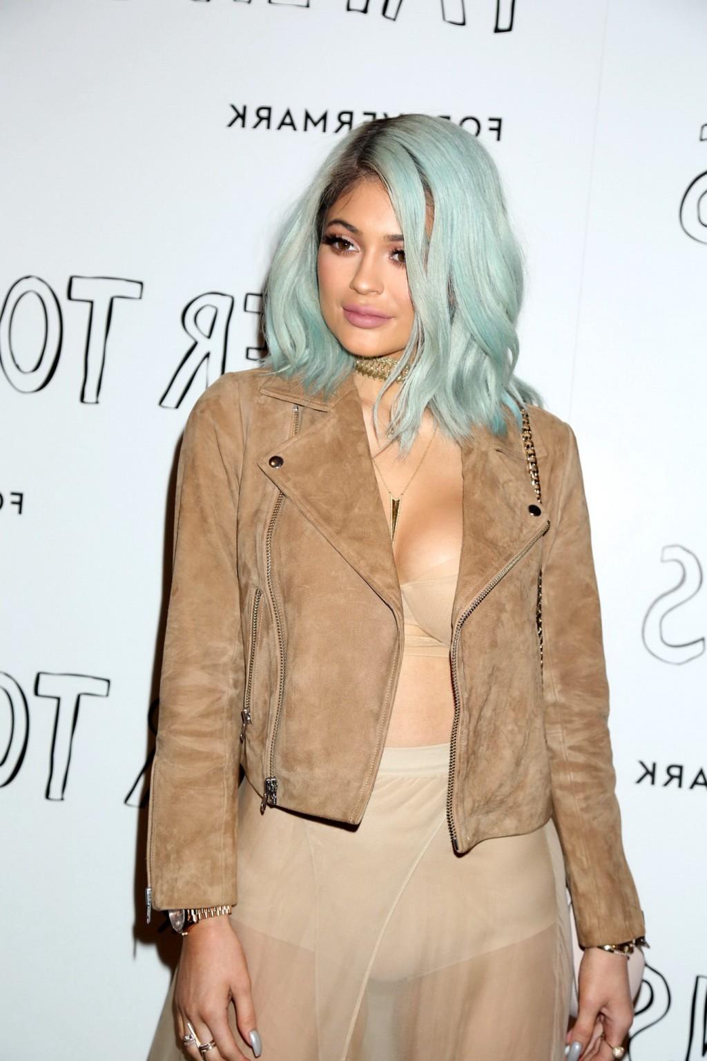 16P Kylie Jenner busty wearing crop top  see through skirt at Paper 