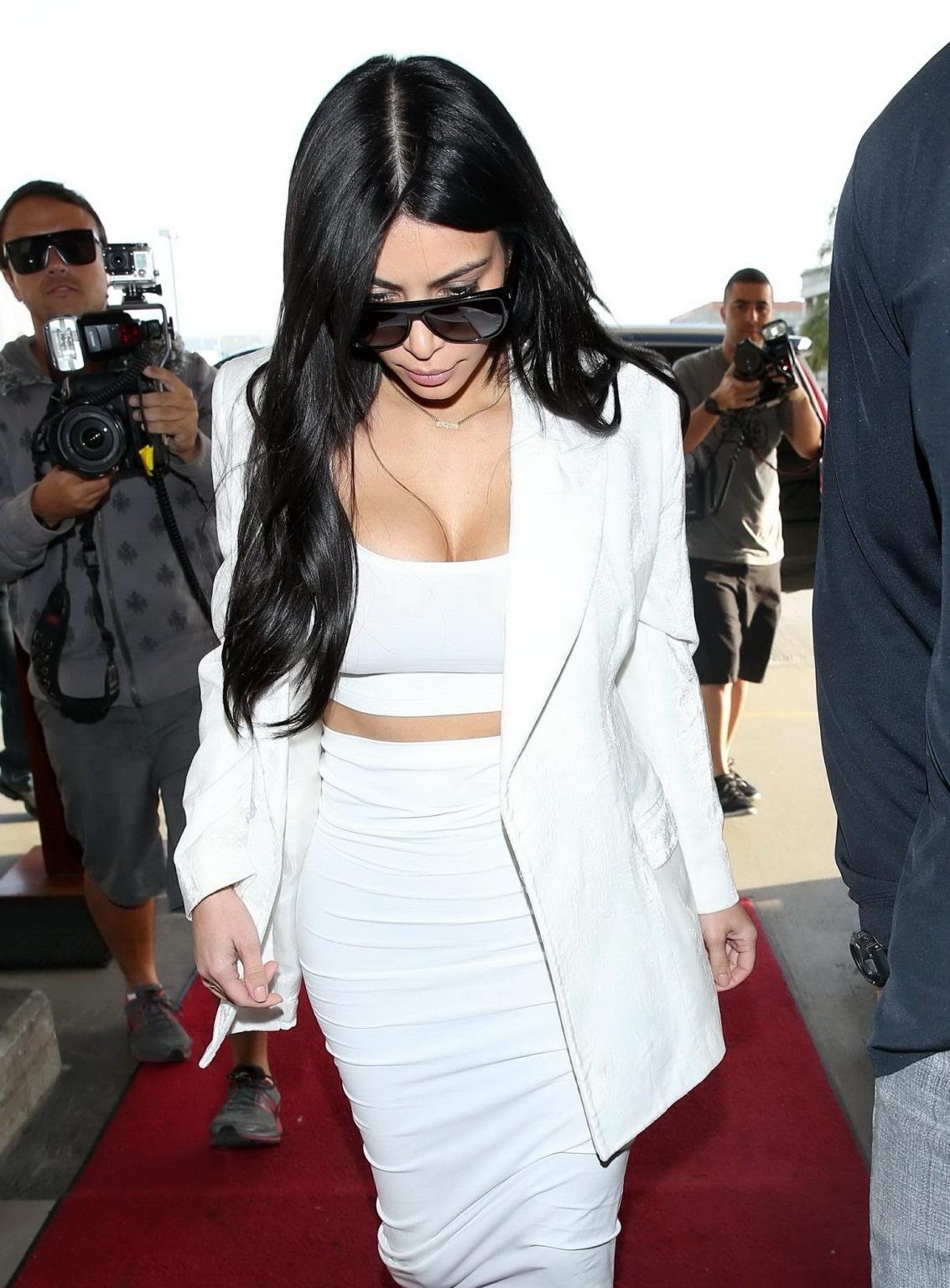 16P Kim Kardashian busty wearing a white crop top at LAX