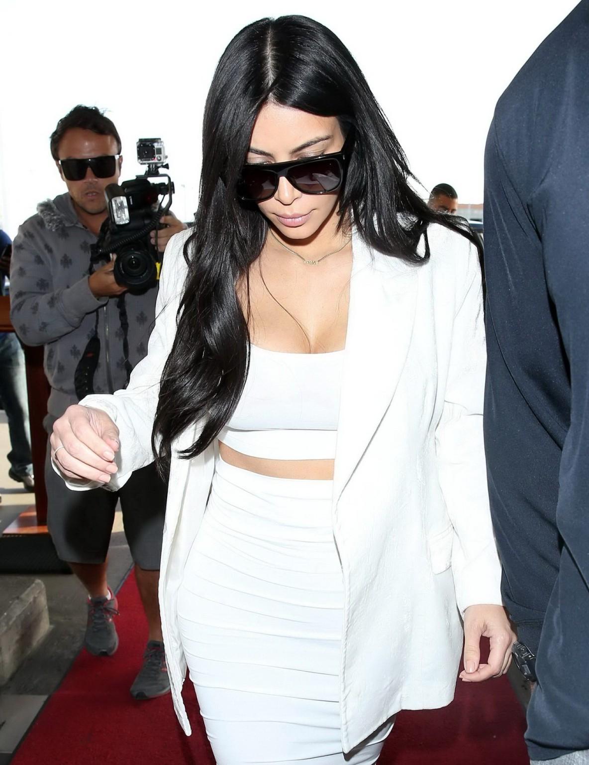 16P Kim Kardashian busty wearing a white crop top at LAX