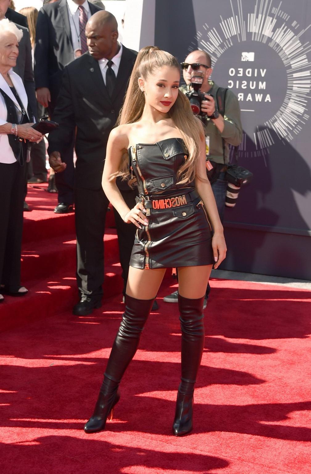 16P Ariana Grande wears black leather mini dress and fuckme boots at 2014 MTV VMA