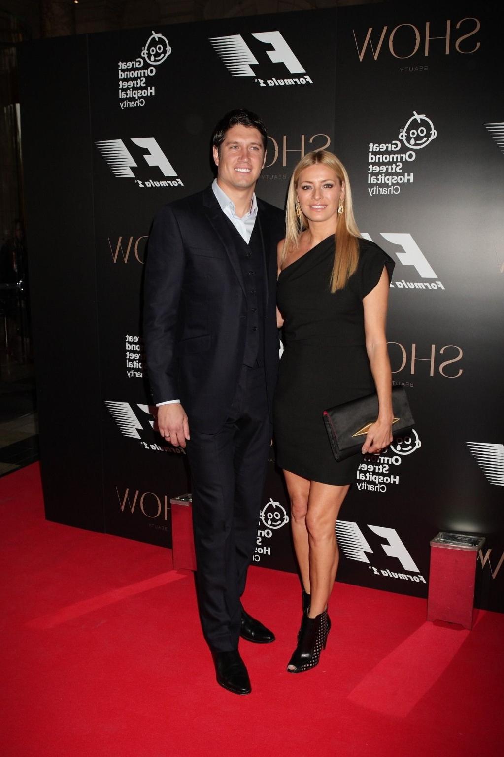 15P Tess Daly flashing her panties at the Great Ormond Street Charity in UK