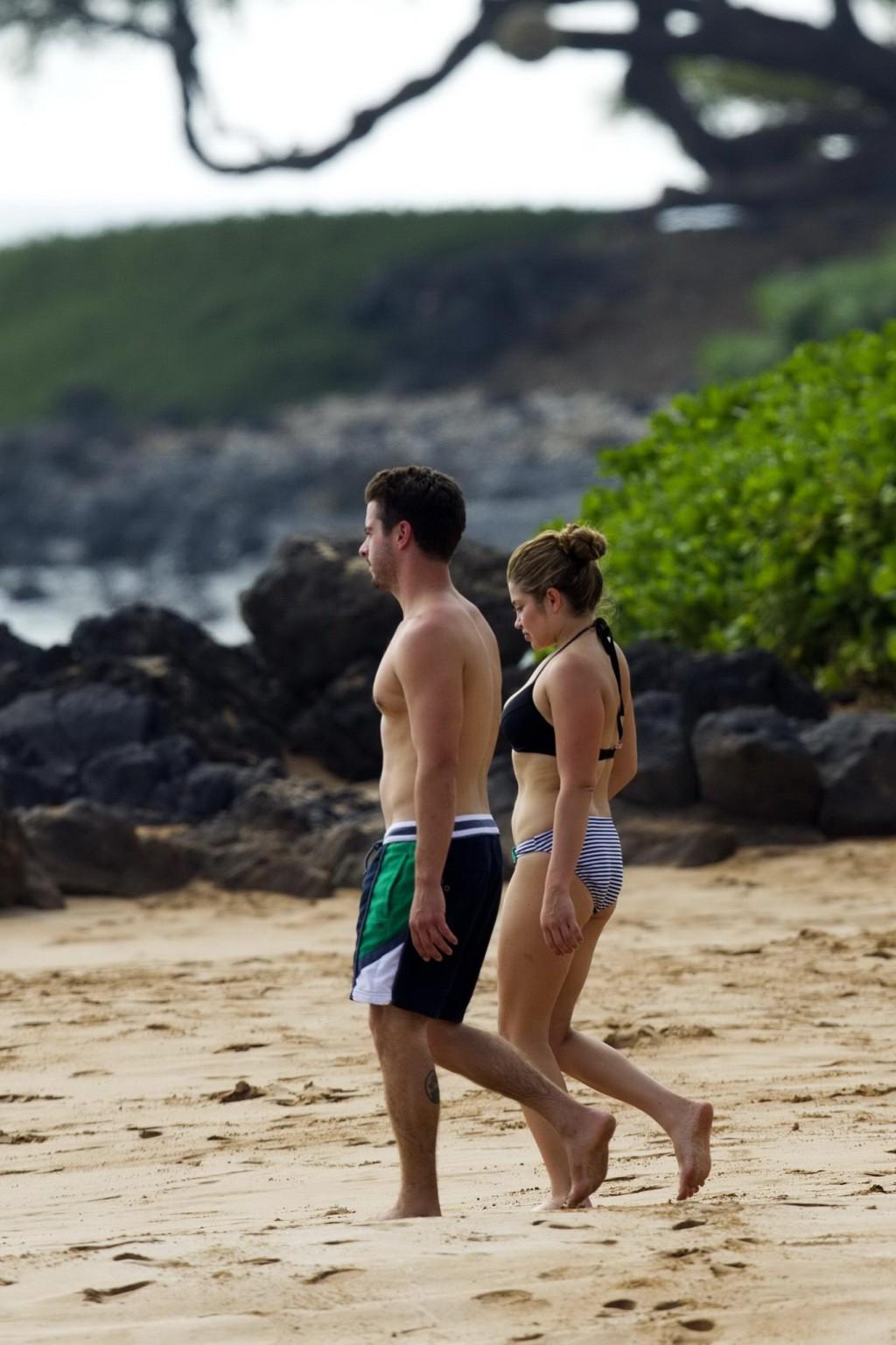 16P Danielle Fishel showing off her plump bikini body on a beach in Hawaii