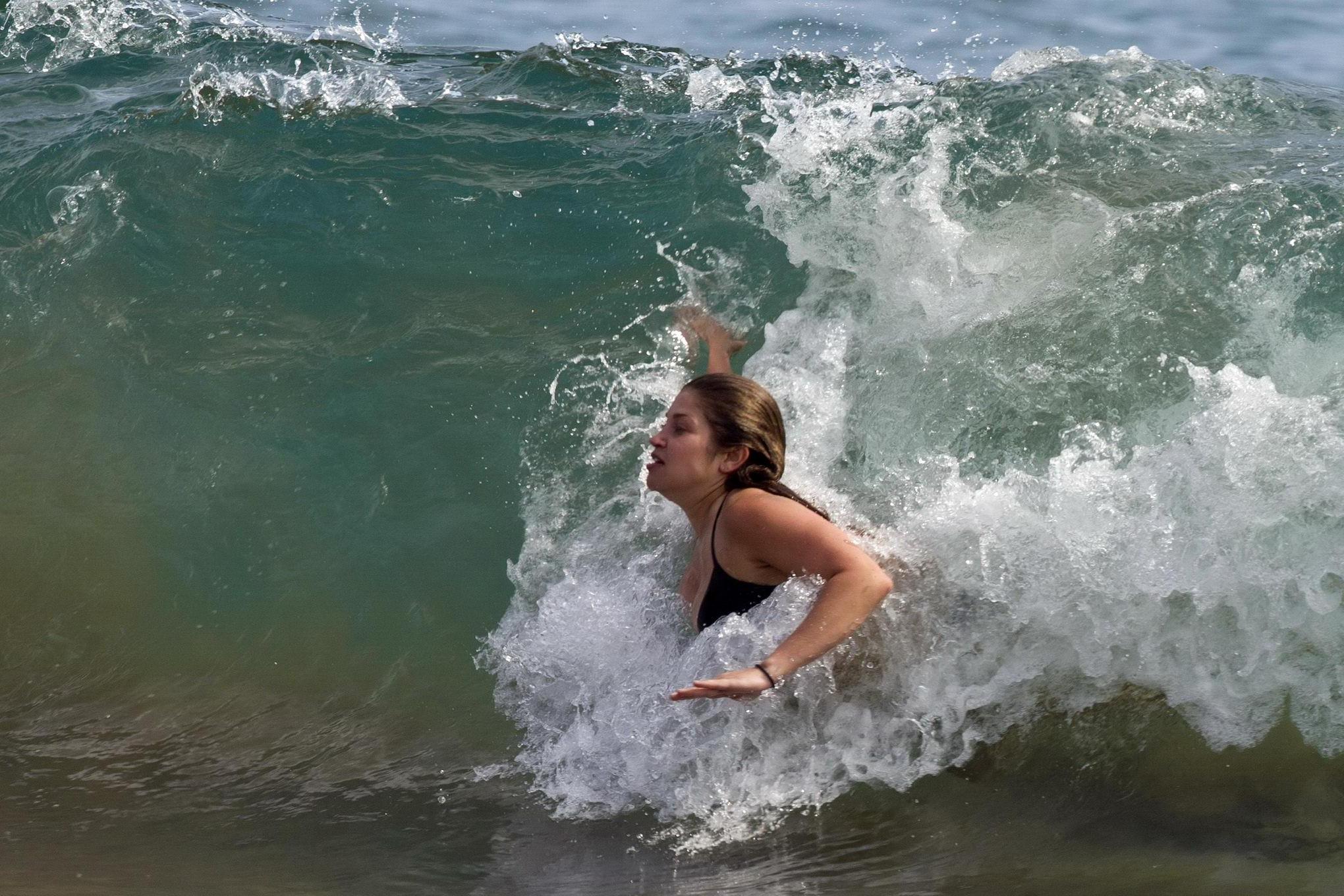 16P Danielle Fishel showing off her plump bikini body on a beach in Hawaii