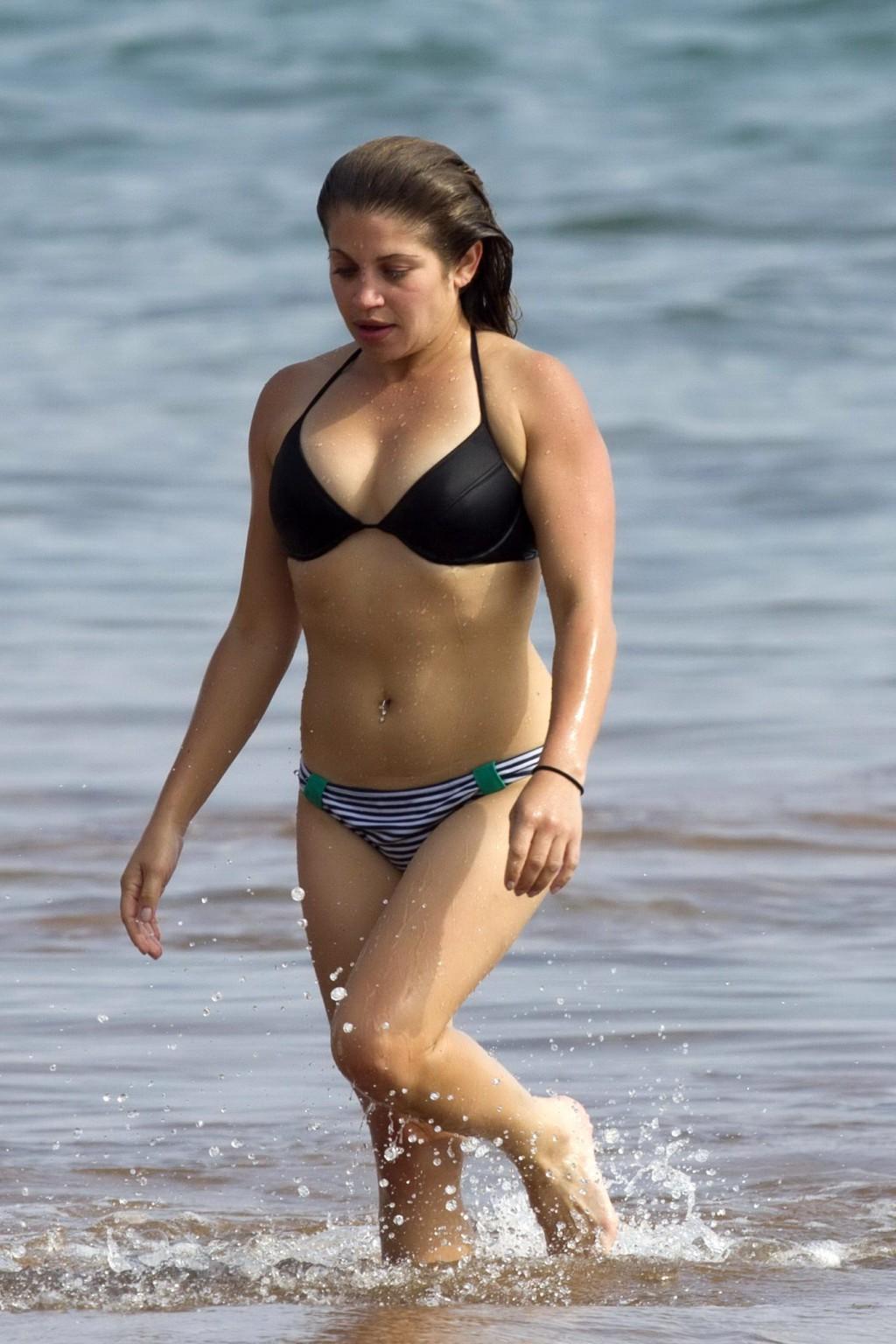 16P Danielle Fishel showing off her plump bikini body on a beach in Hawaii