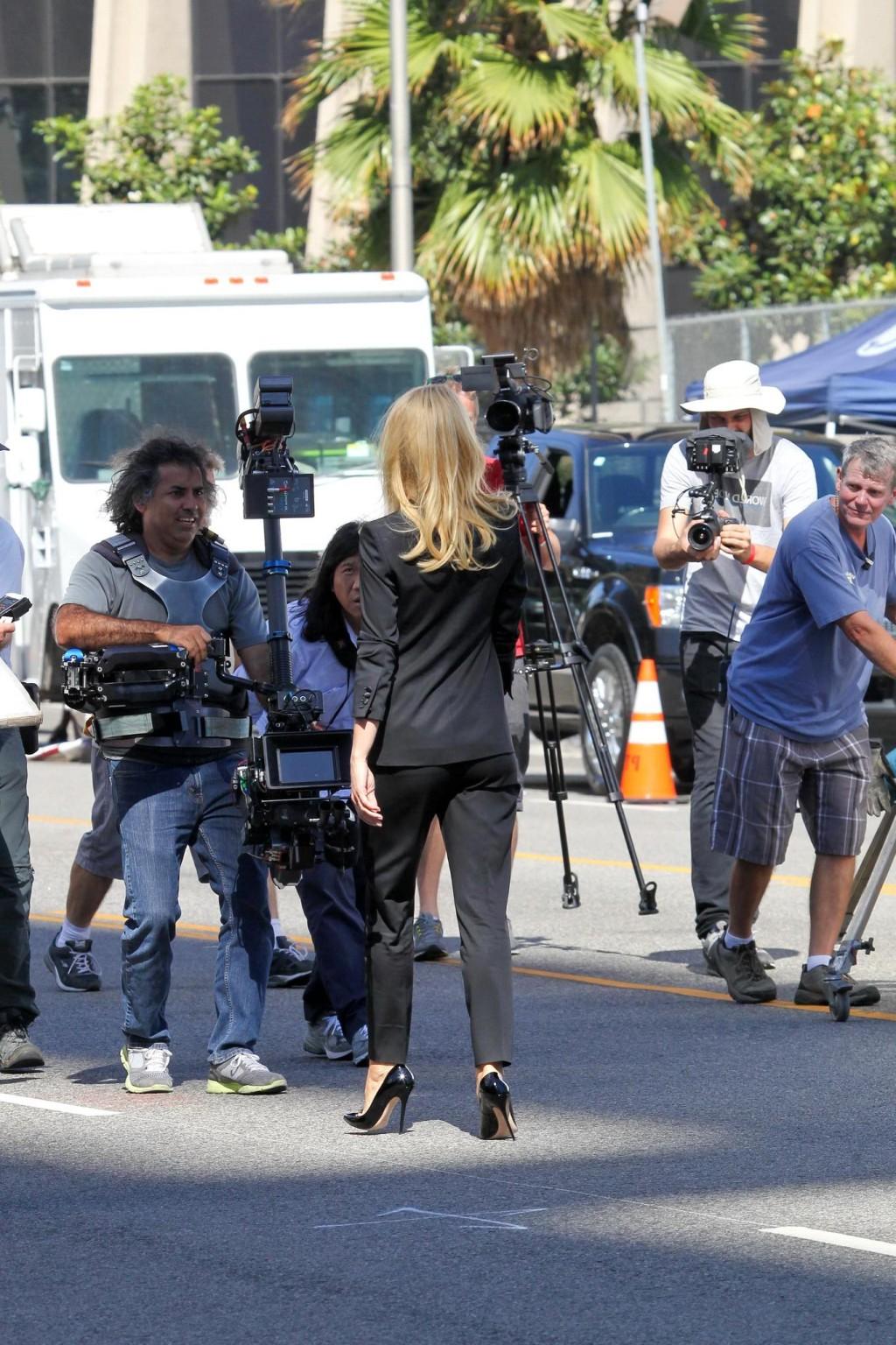 16P Gwyneth Paltrow braless showing huge cleavage on the set of a Hugo Boss campaign
