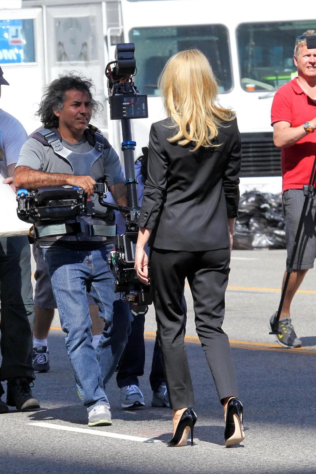 16P Gwyneth Paltrow braless showing huge cleavage on the set of a Hugo Boss campaign