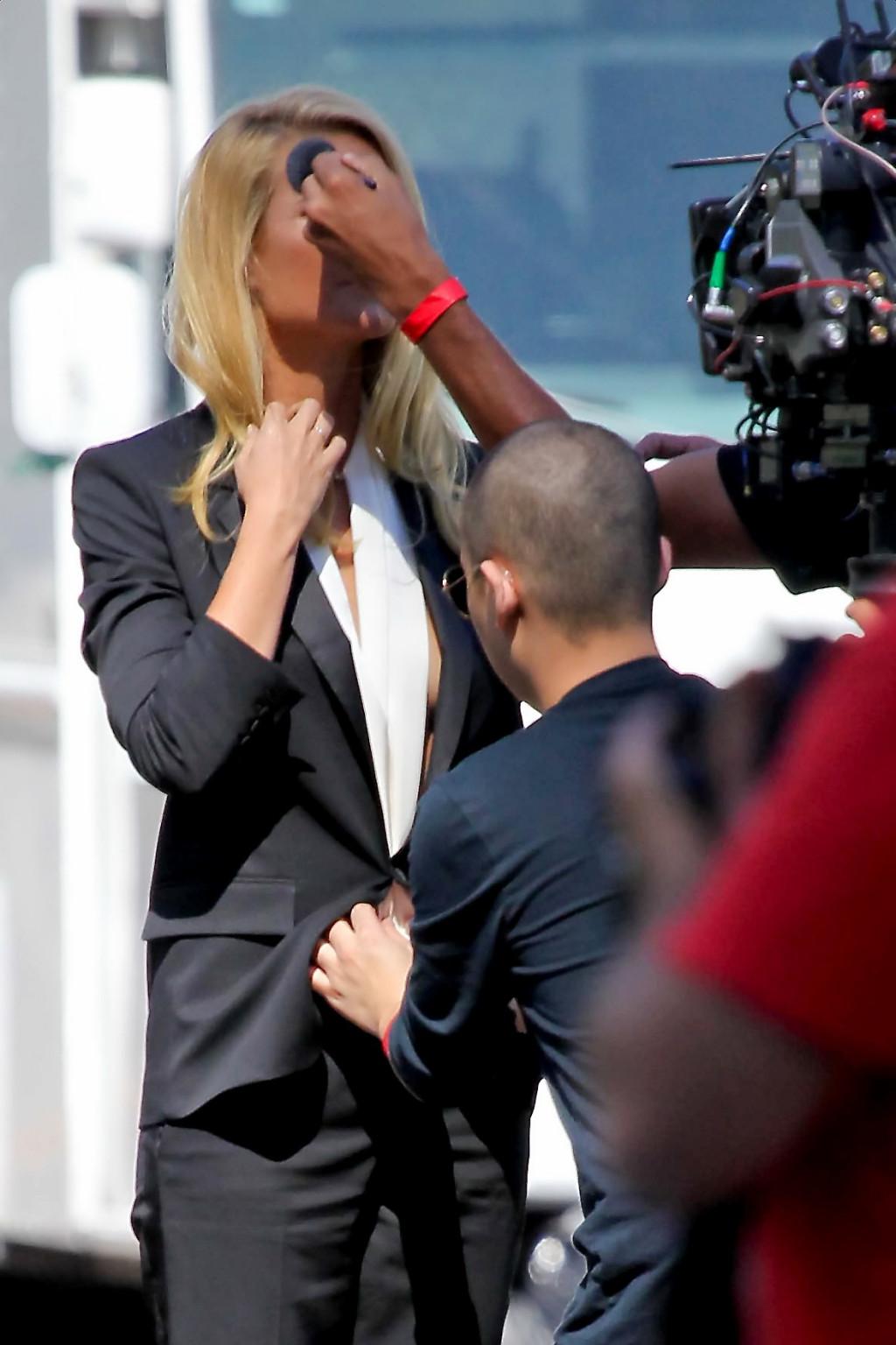 16P Gwyneth Paltrow braless showing huge cleavage on the set of a Hugo Boss campaign