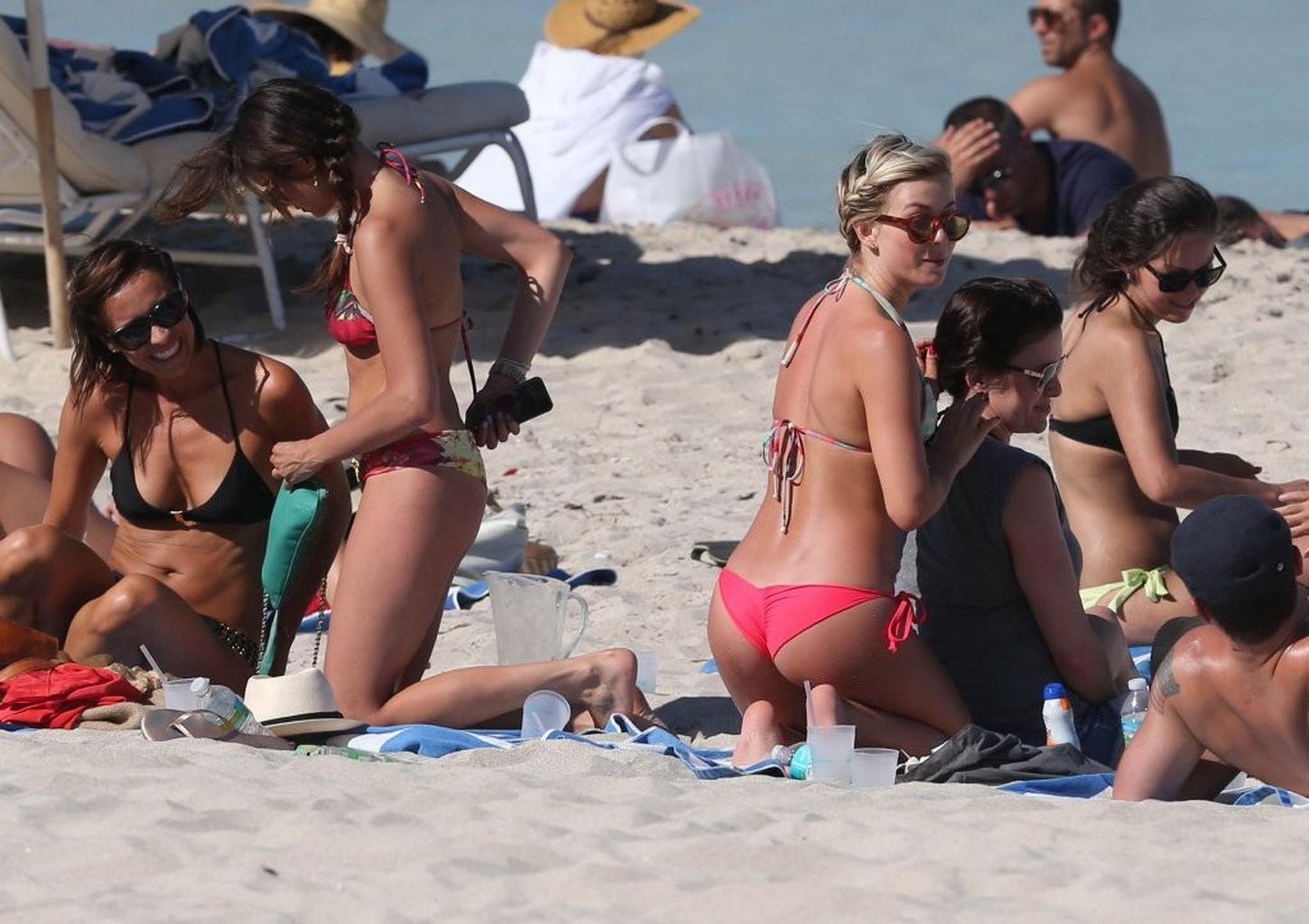 16P Nina Dobrev showing off her floral bikini booty at the beach in Miami