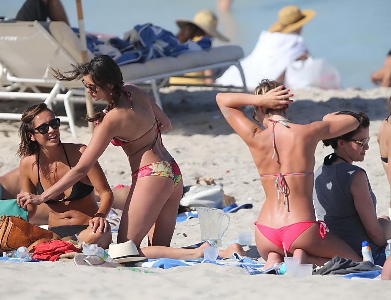 16P Nina Dobrev showing off her floral bikini booty at the beach in Miami
