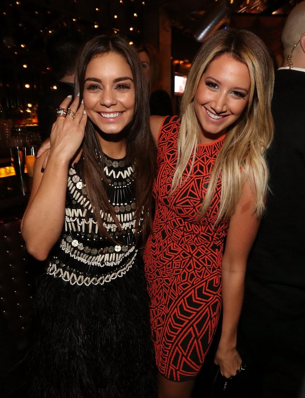 16P Ashley Tisdale wearing tight patterned orange mini dress at Spring Breakers prem