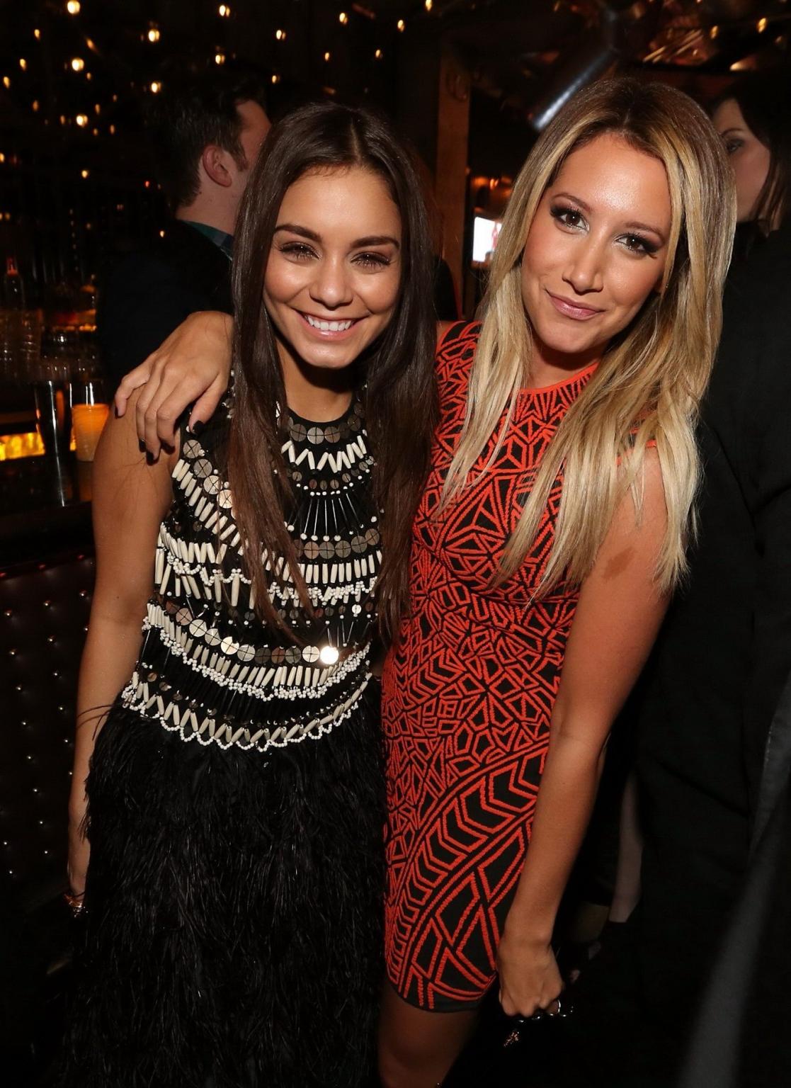 16P Ashley Tisdale wearing tight patterned orange mini dress at Spring Breakers prem