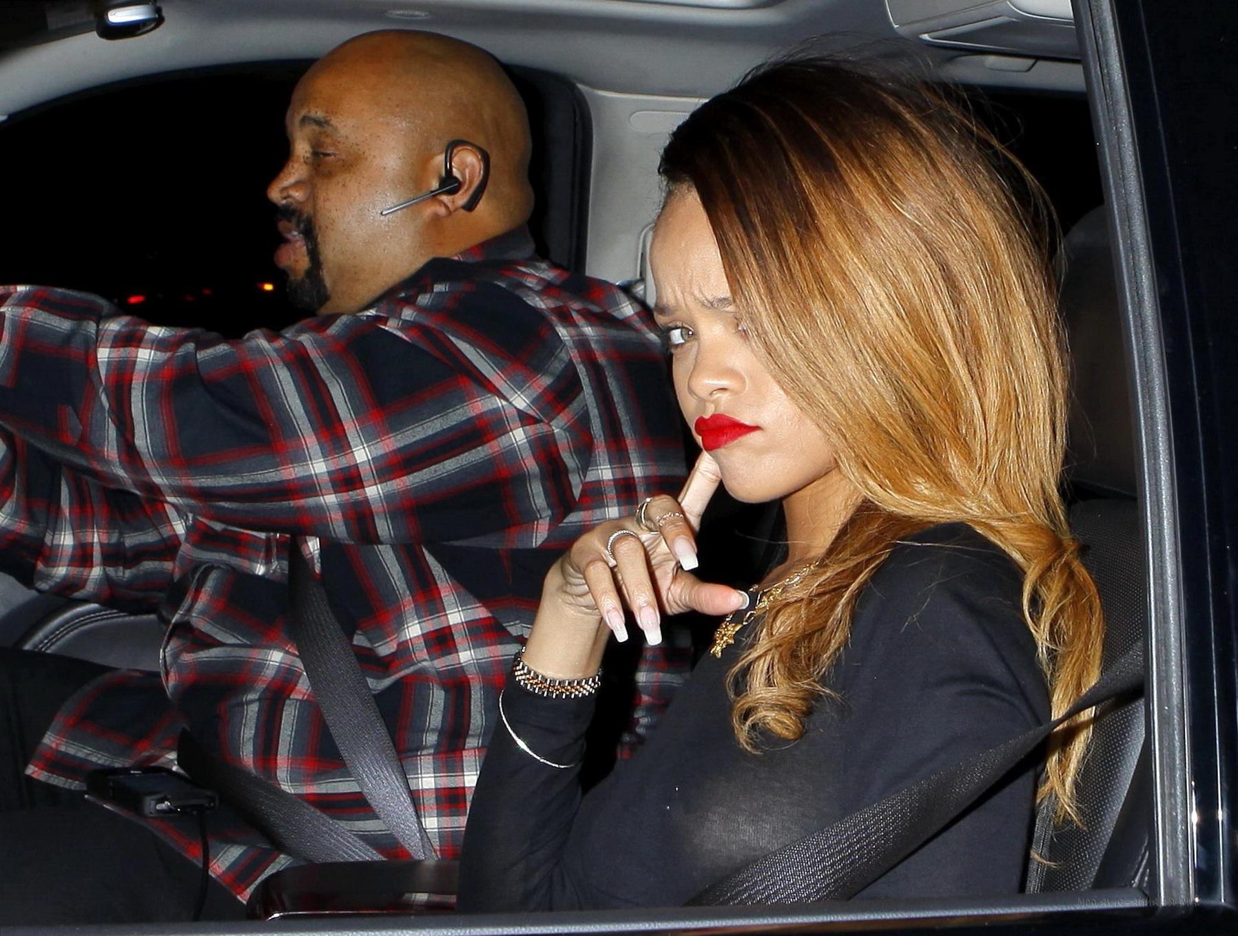 10P Rihanna shows her pierced boobs  black panties wearing a see through dress  in L