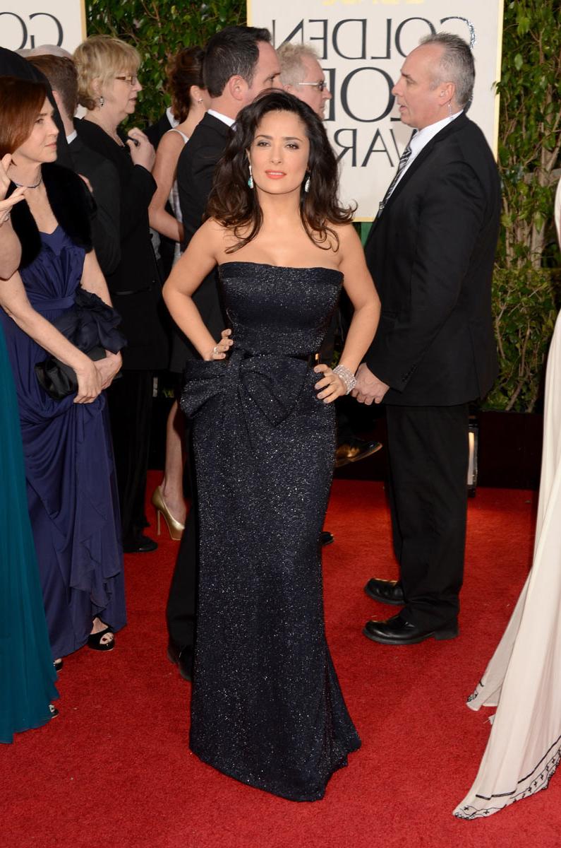 15P Salma Hayek takes her booty and cleavage out