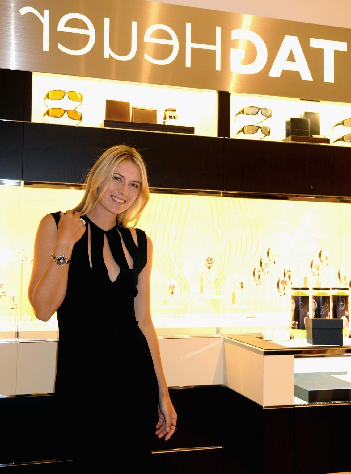 16P Maria Sharapova braless wearing a sexy black dress at TAG Heuer Aventura store o