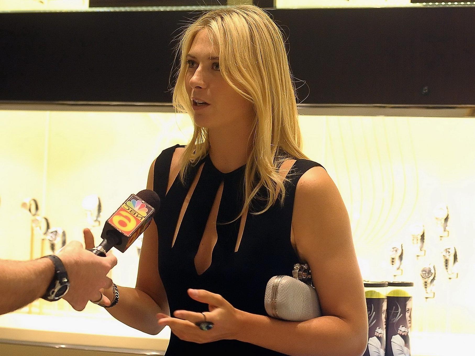 16P Maria Sharapova braless wearing a sexy black dress at TAG Heuer Aventura store o