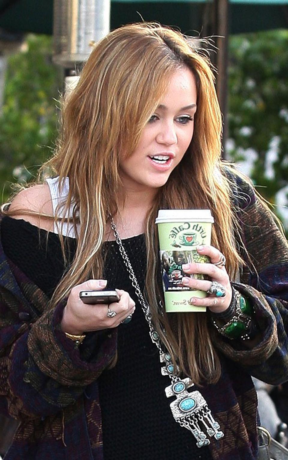 16P Miley Cyrus exposing sexy legs on street new paparazzi photos