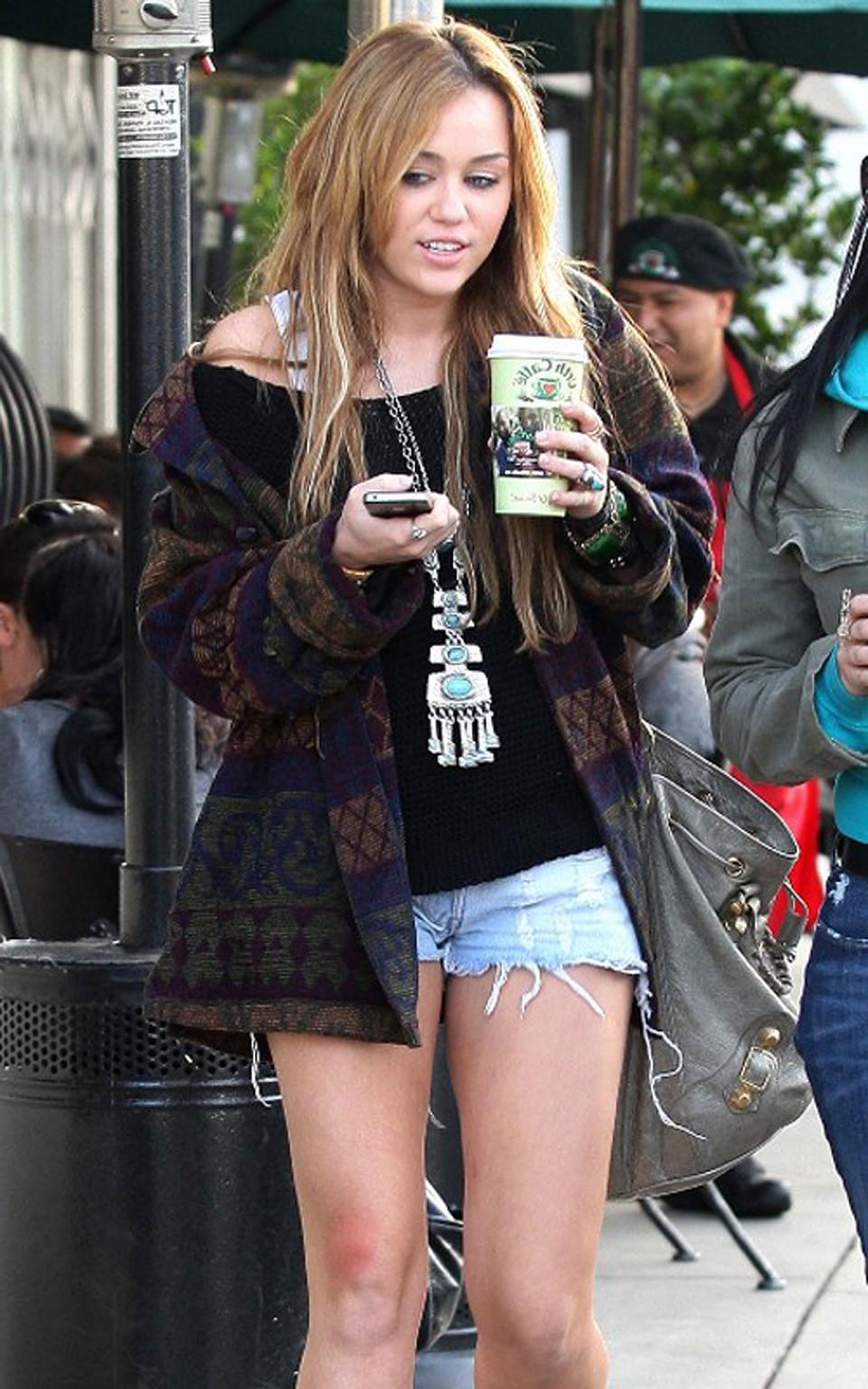 16P Miley Cyrus exposing sexy legs on street new paparazzi photos