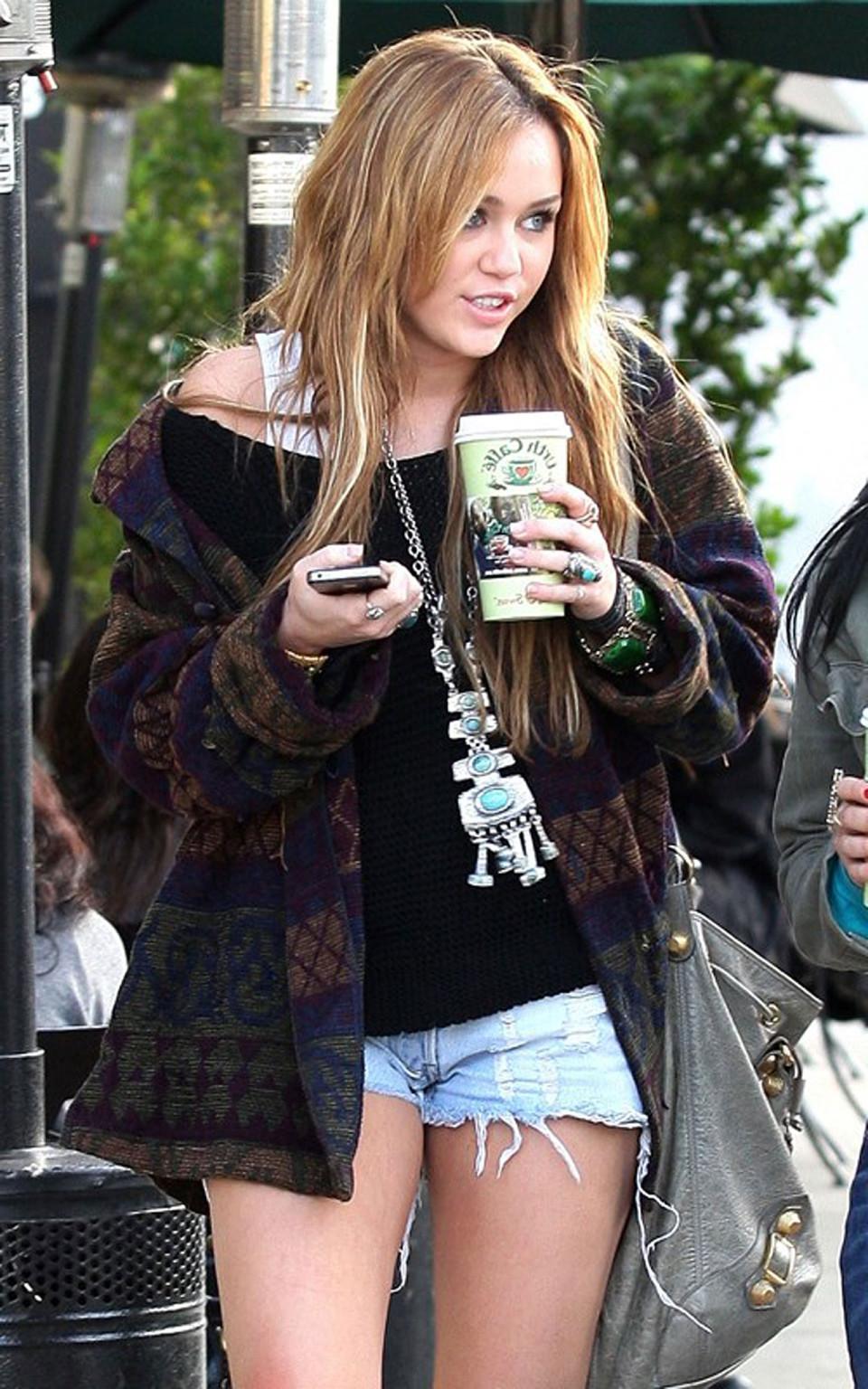 16P Miley Cyrus exposing sexy legs on street new paparazzi photos