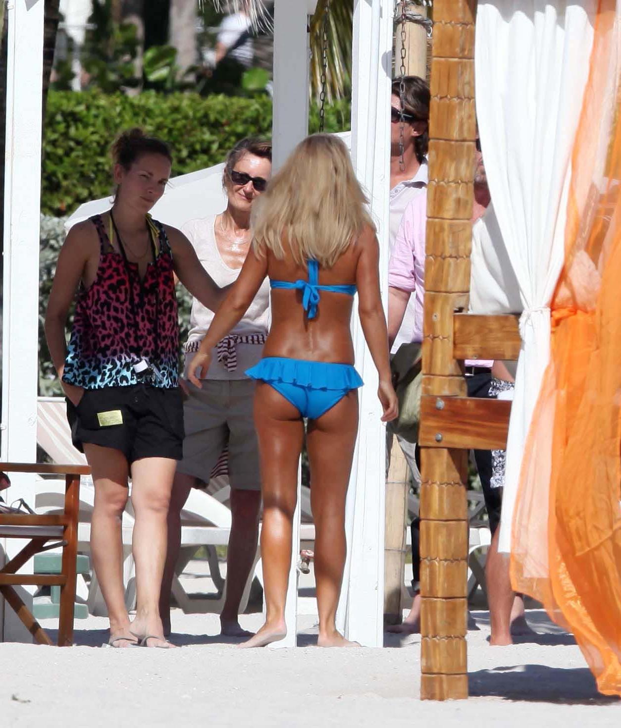 16P Geri Halliwell busty wearing navy strip bikini out on her hotel balcony in Miami