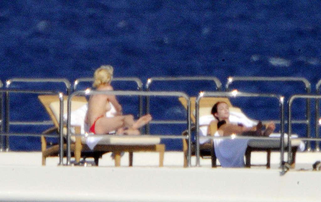 10P Paris Hilton flashing her panties upskirt on street and exposing her tits on yac